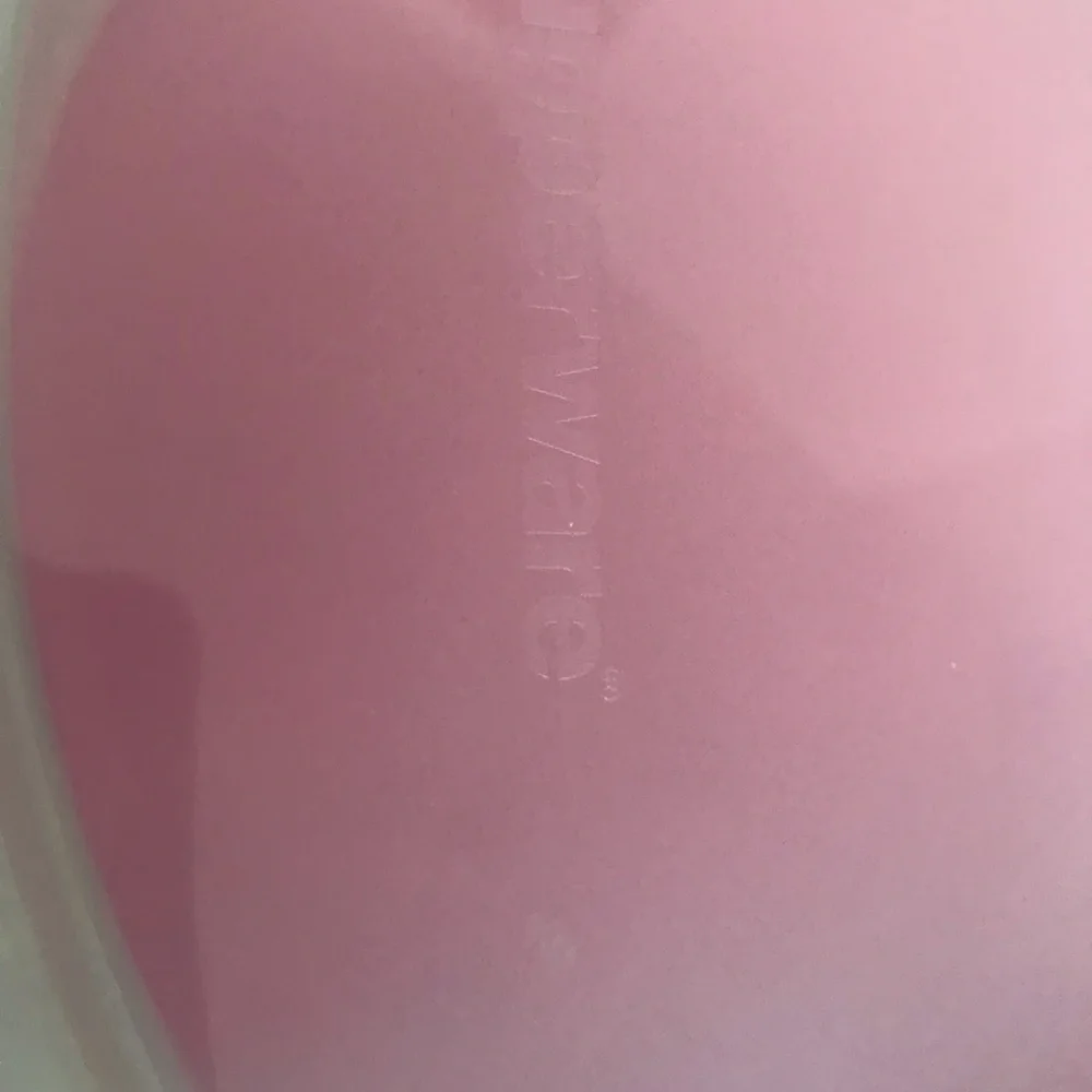 Tupperware pink expandable